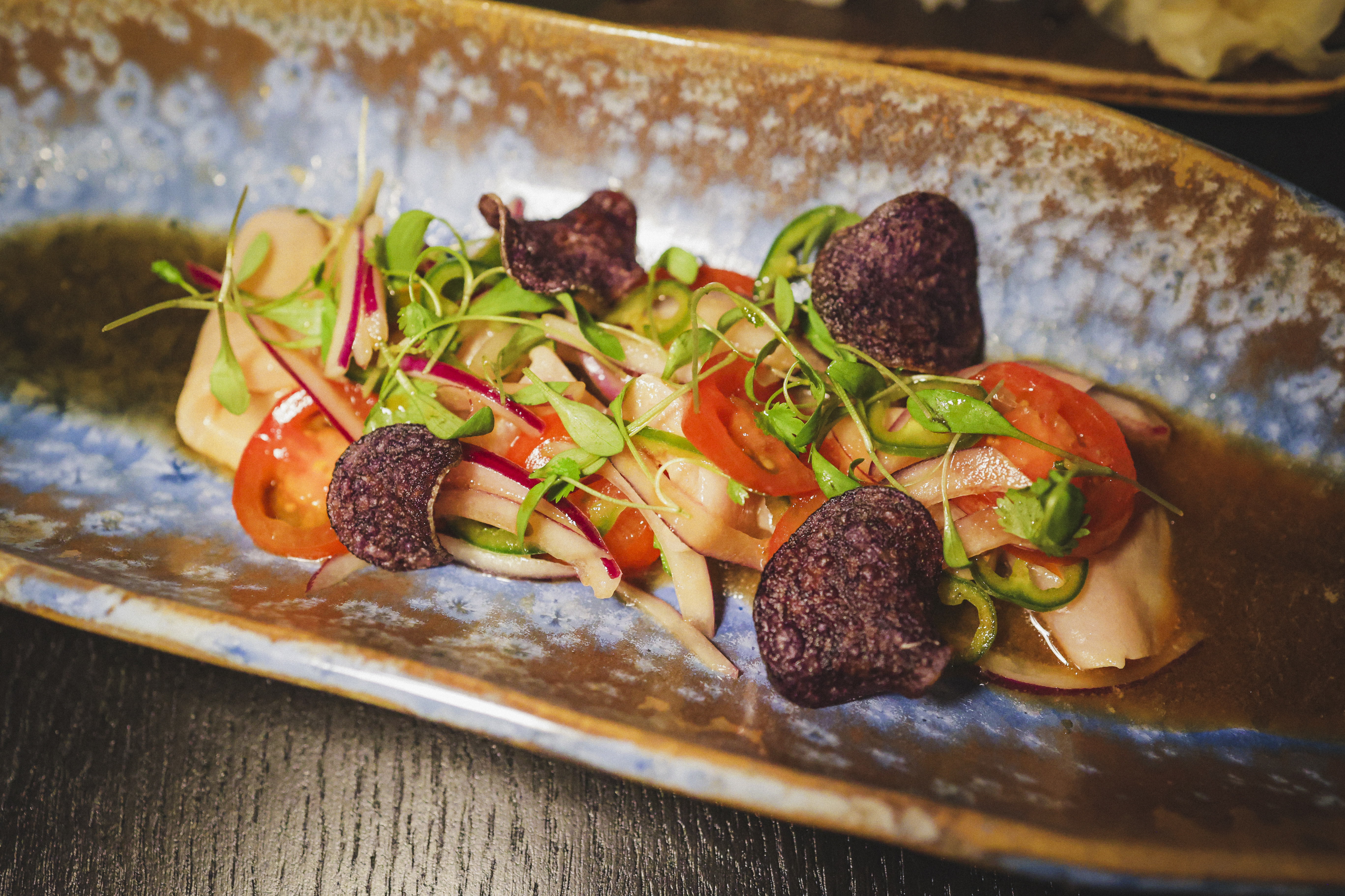 Yellowtail “Nikkei Sashimi” GF Cherry tomatoes, jalapeño, coriander, yuzu truffle soy