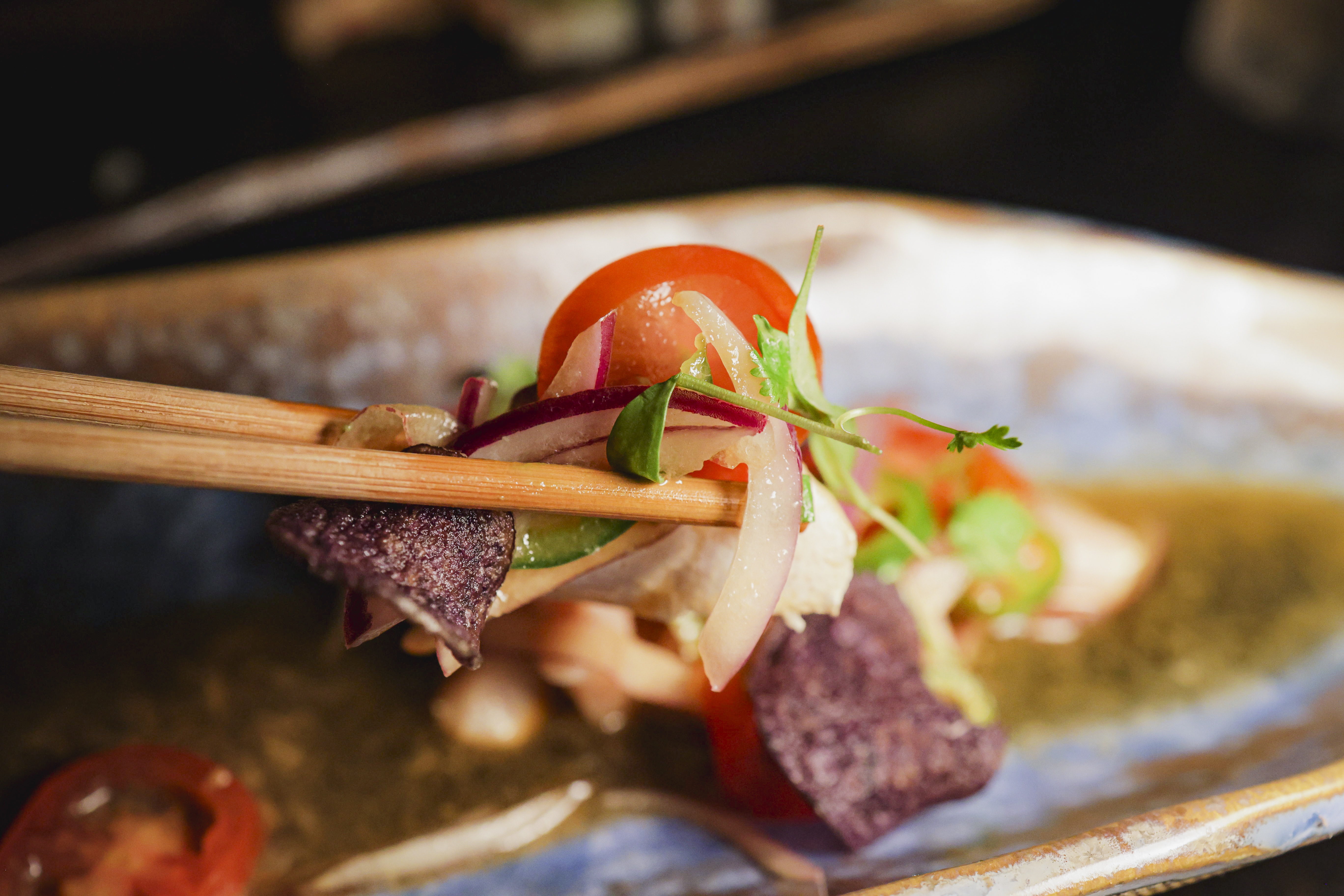 Yellowtail “Nikkei Sashimi” GF Cherry tomatoes, jalapeño, coriander, yuzu truffle soy