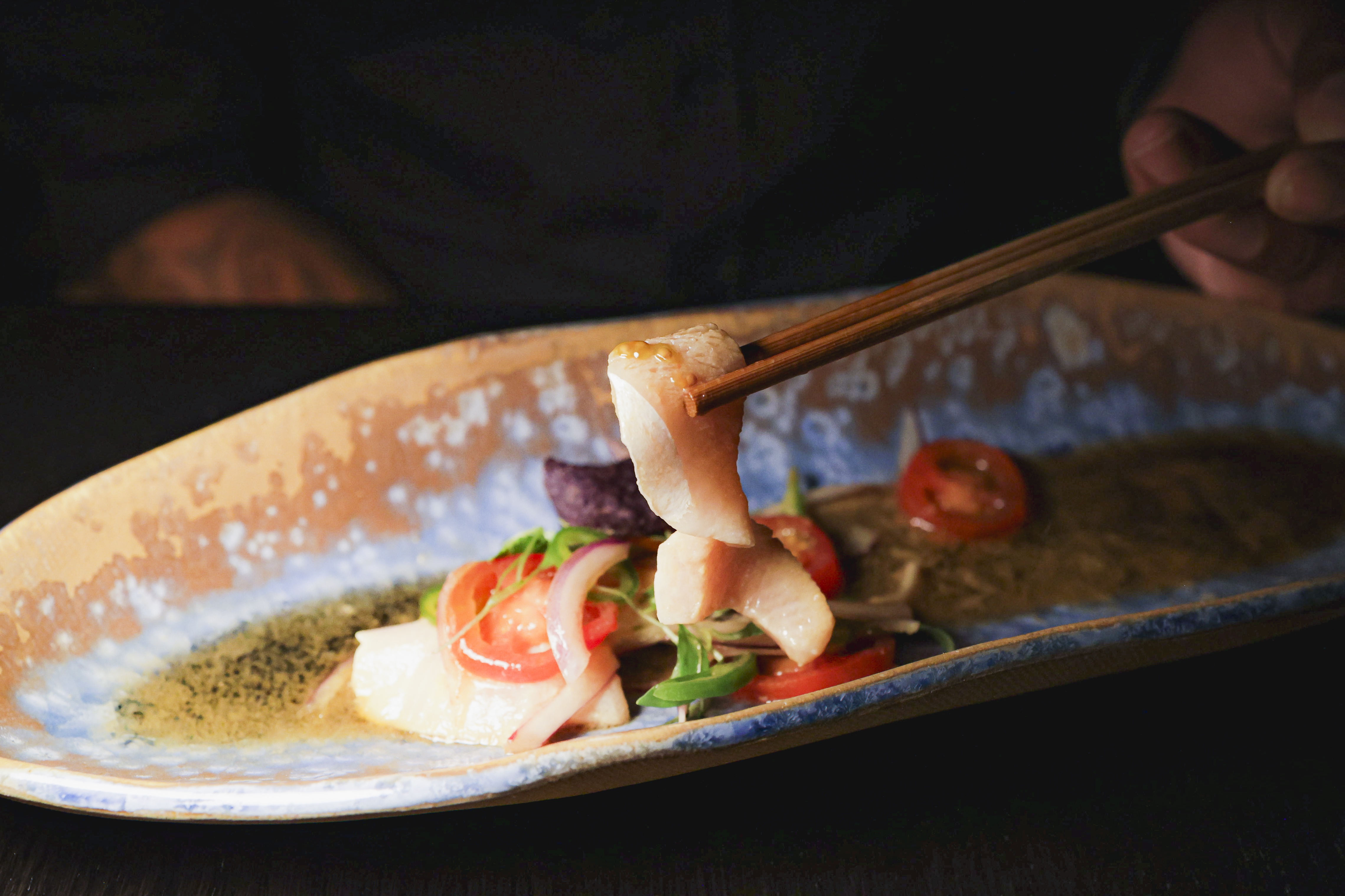 Yellowtail “Nikkei Sashimi” GF Cherry tomatoes, jalapeño, coriander, yuzu truffle soy