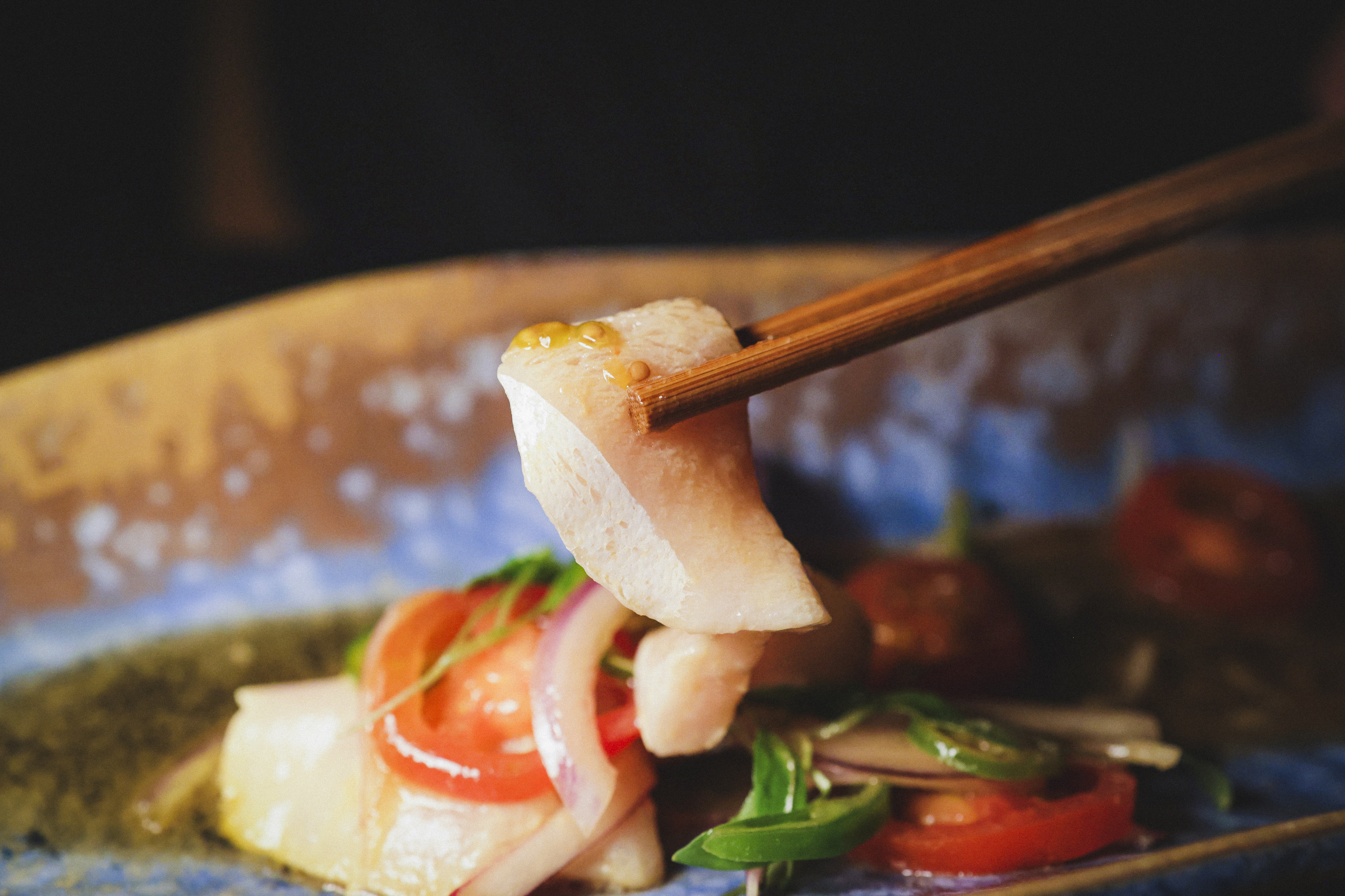 Yellowtail “Nikkei Sashimi” GF Cherry tomatoes, jalapeño, coriander, yuzu truffle soy